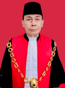 Nawawi Pomolango, S.H., M.H.